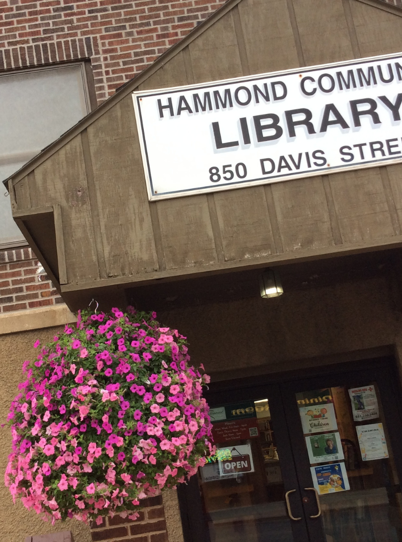 Library entrance with flowers